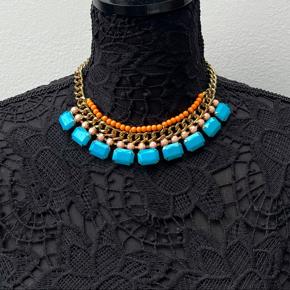blue rhinestones and orange beads statement necklace